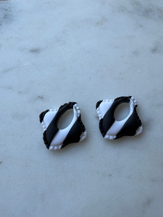Clara : Delta Charms