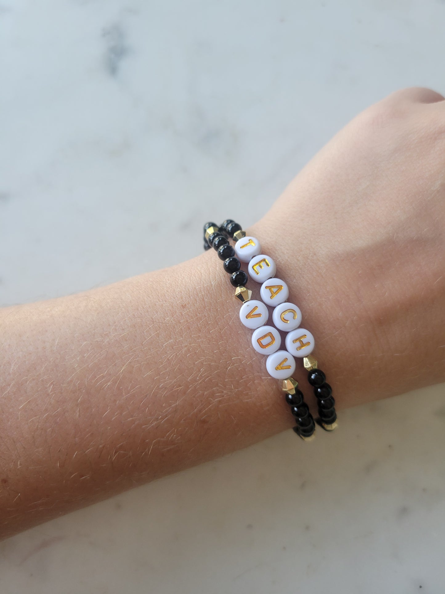 Teach Stretchy Bracelet: Black and Gold