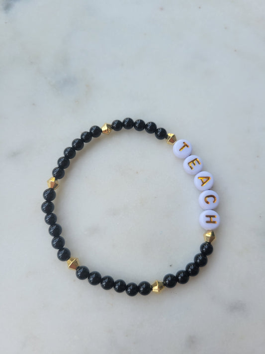 Teach Stretchy Bracelet: Black and Gold